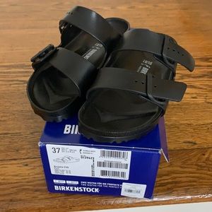 Brand new never worn black Birkenstock slides